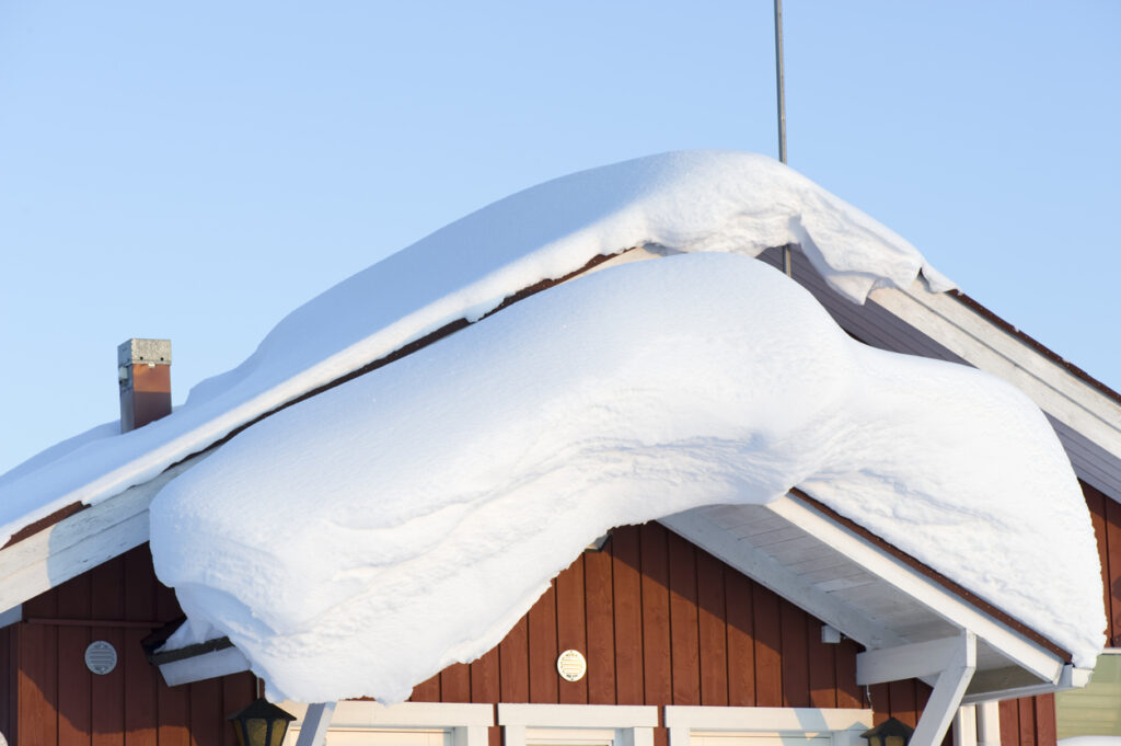 Some Impacts of Snow and Ice on a Roof